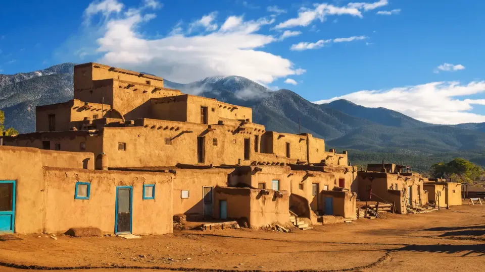 Multi-story adobe housing in New Mexico mountains