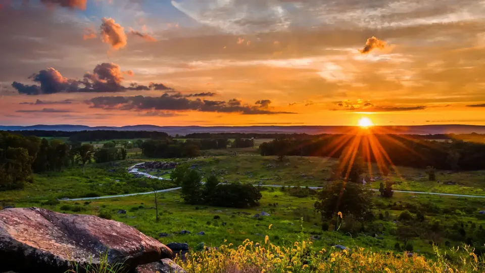 Pennsylvania rural farm with sun setting in the background