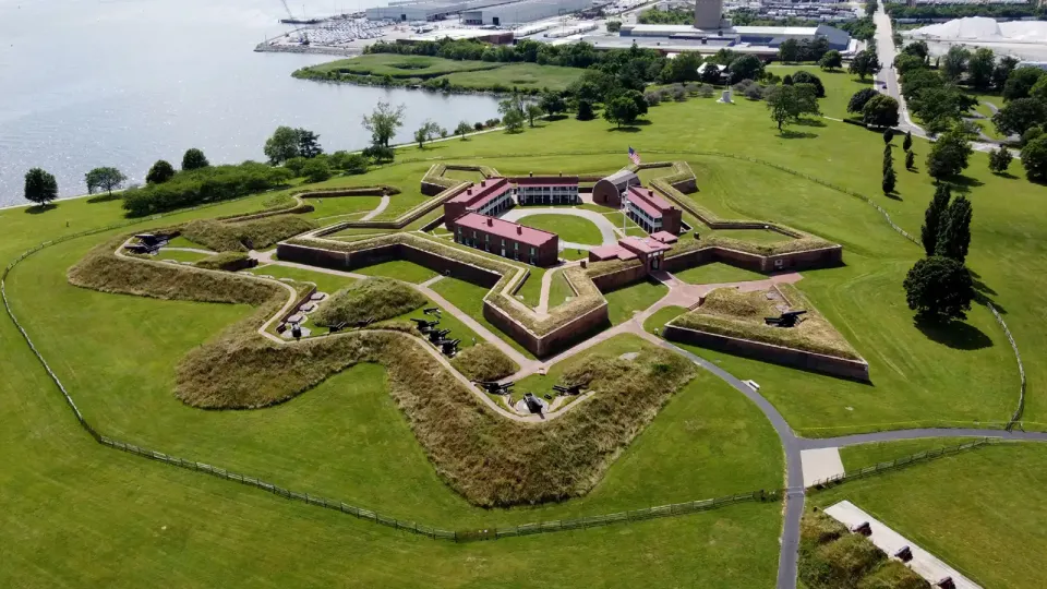 Maryland's historic, star-shaped Fort McHenry lined with green shrubs and walking paths